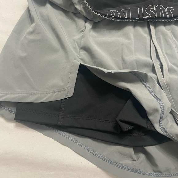 Gray Nike running shorts with attached black spandex underneath - Picture 3 of 4